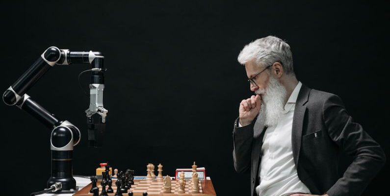 Strategic Partnerships - Elderly Man Thinking while Looking at a Chessboard